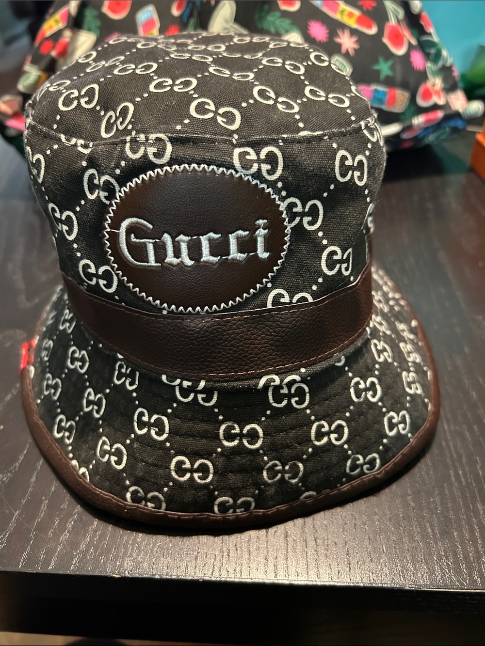 Source Unknown Black and Brown Logo Bucket Hat